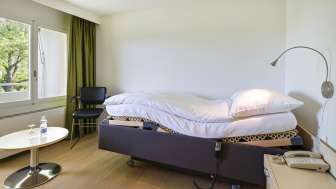 Einzelzimmer E-Bett